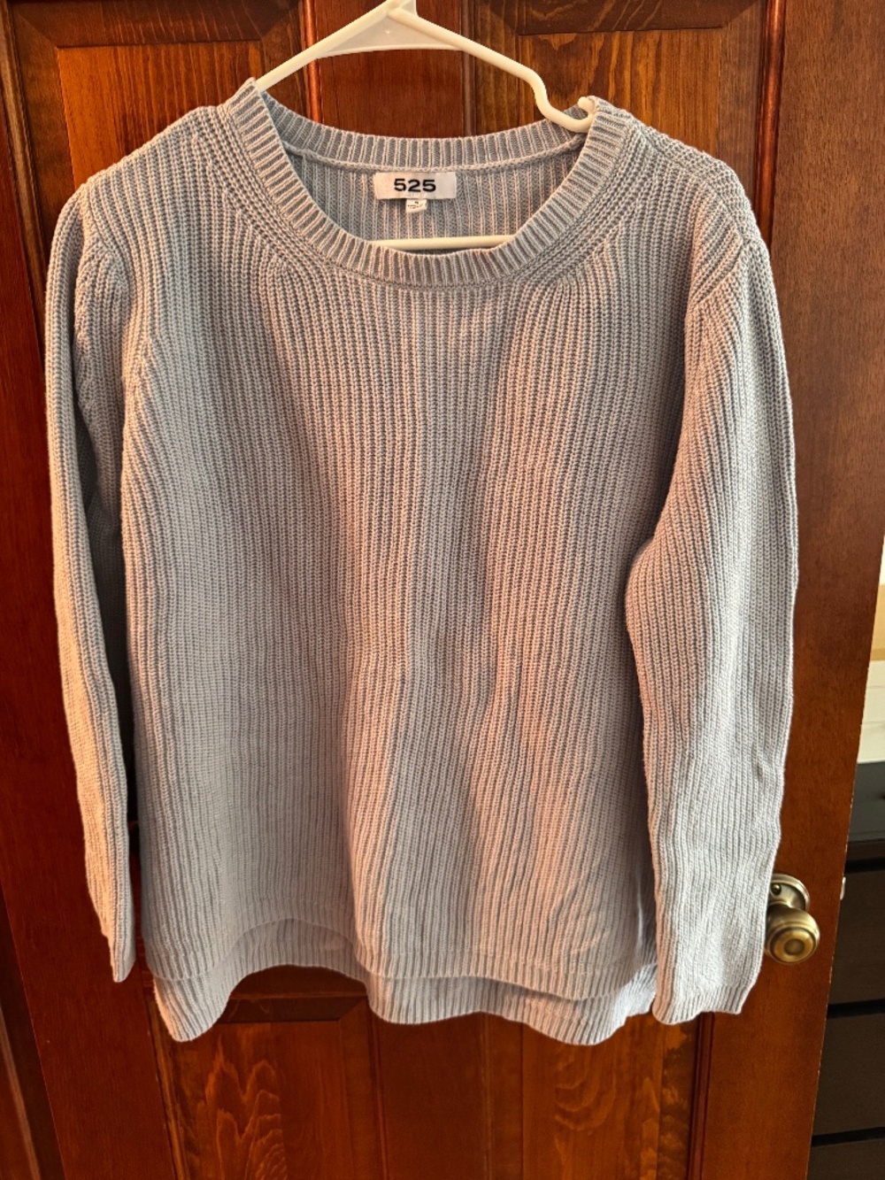 Women’s light blue sweater